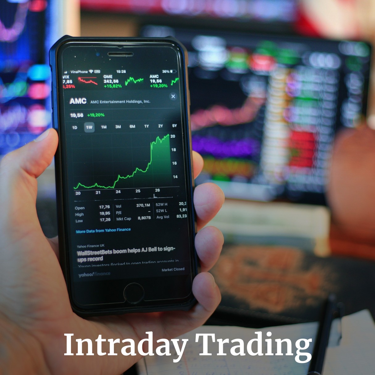 Image of a smartphone showing intraday trading chart that is in green.